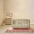 Light oak cot bed and matching dresser with three drawers