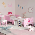 Pink toddler bed with princess bow motif, heart and ice-cream patterns, low guardrails and open frame
