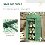Green mini greenhouse with interior storage shelf and multiple planters through PE mesh cover