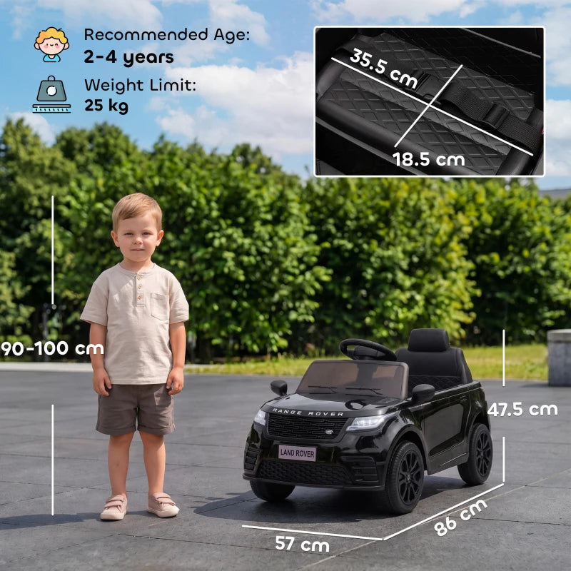 Black ride-on electric car with front grille, windshield, and two-seat cabin