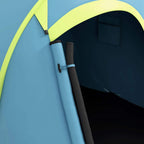Blue pop-up dome tent close-up of support pole and open dark interior doorway