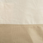 Beige PU-coated fabric texture with stitched border detail