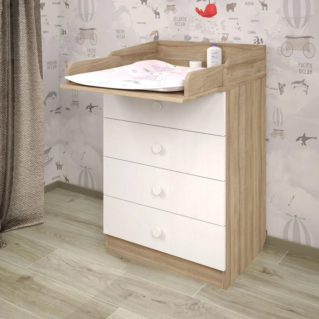 Kids changing dresser with elm sides, white drawers, and upper changing shelf holding supplies