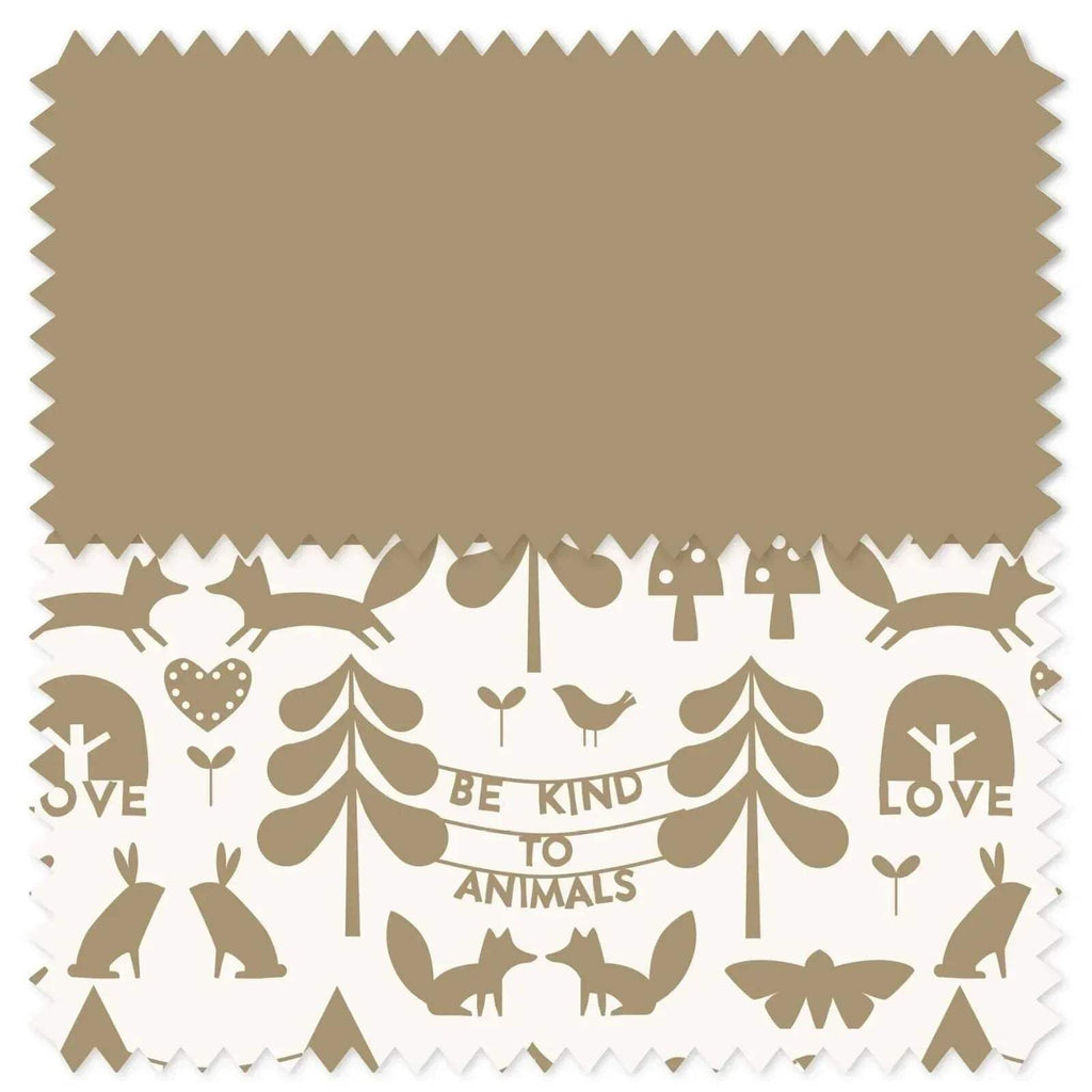 Fabric swatch with beige and cream forest and animal graphic pattern