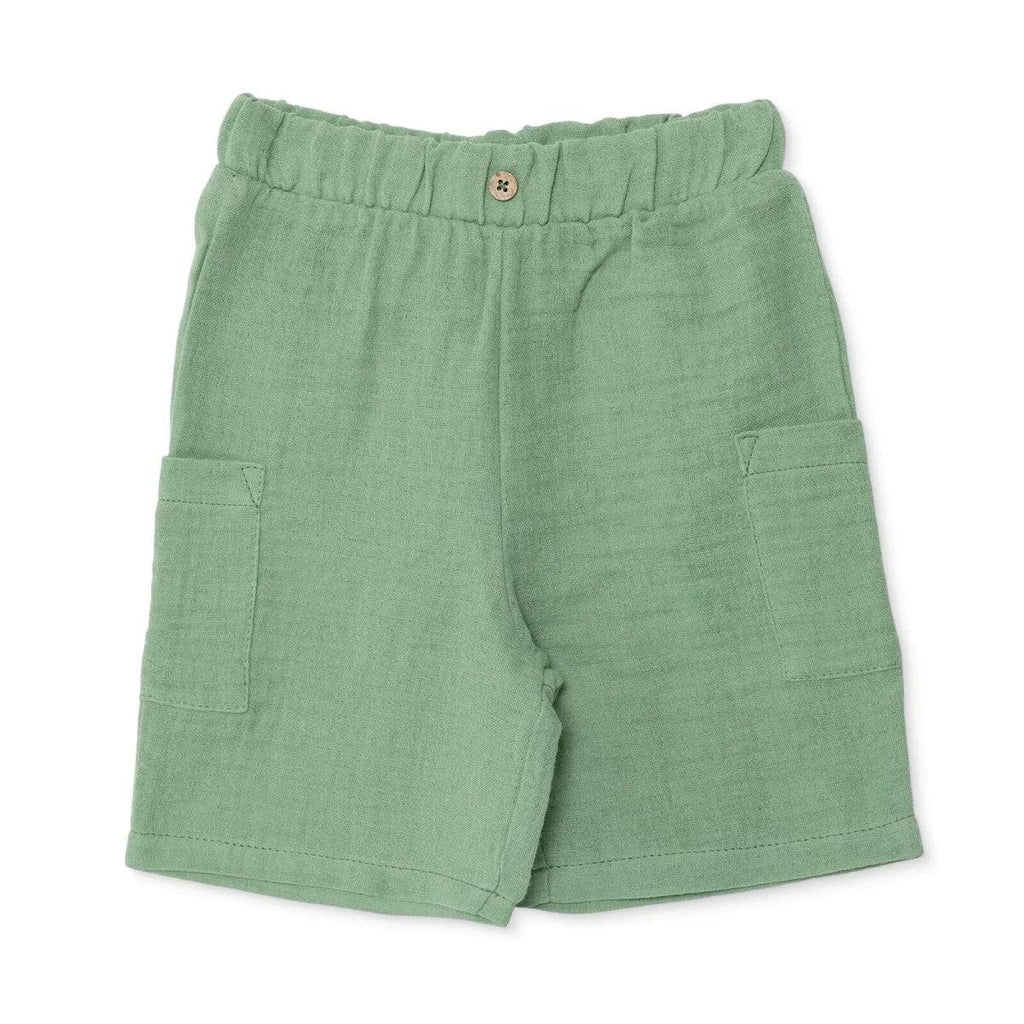 Muslin baby shorts in green with elastic waistband and side pockets