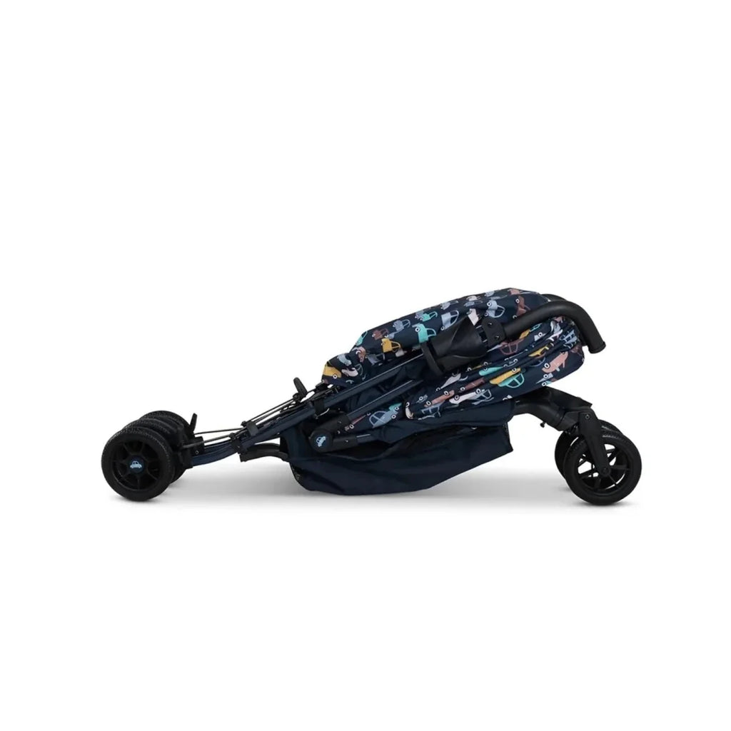 Baby stroller with navy seat and patterned canopy, side profile and rear wheels visible