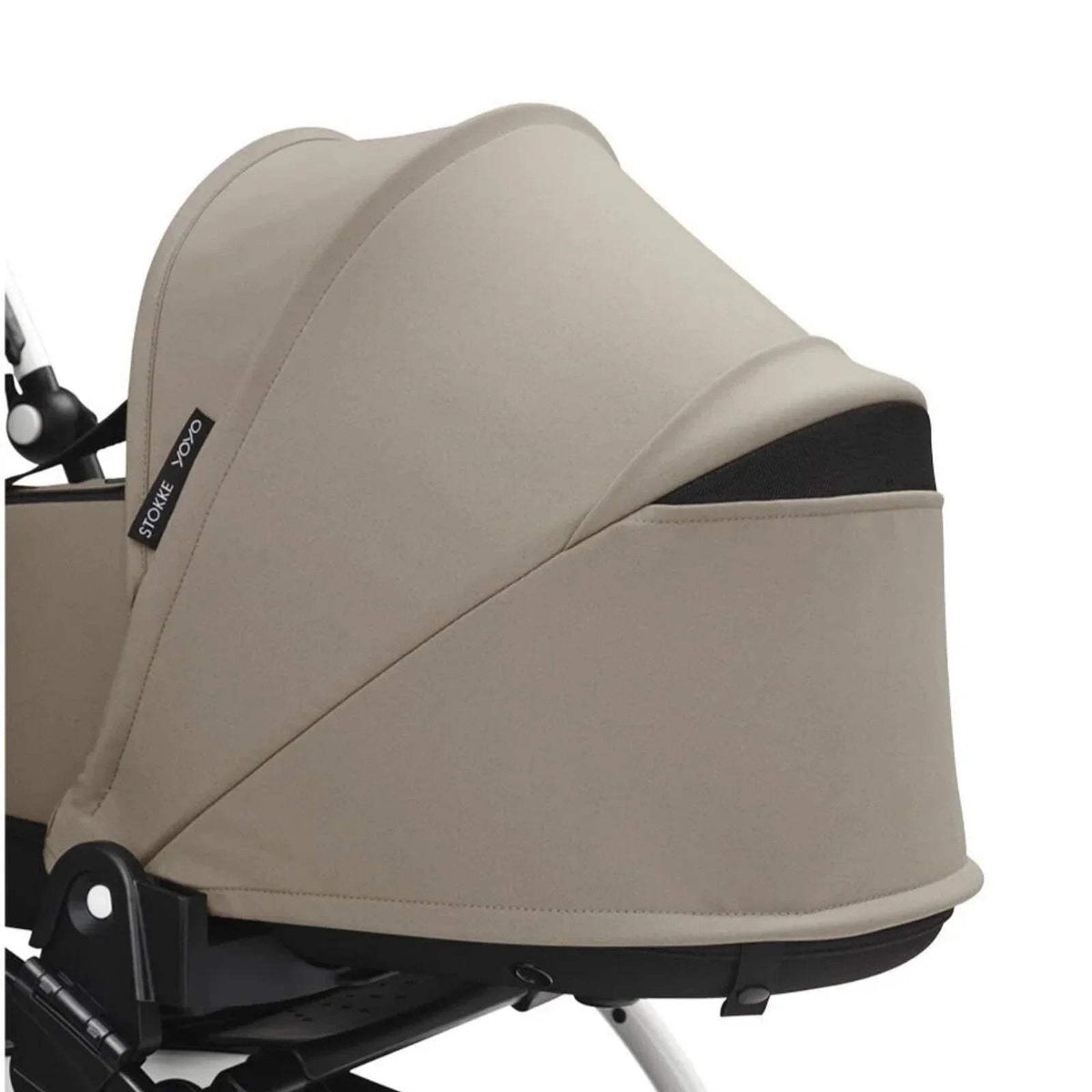 Taupe newborn shell side view with hood and black base edge