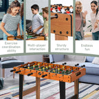 Foosball table in living room with mounted rods and colorful player figures