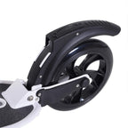 White scooter deck and large wheel with black fender, axle and suspension detail