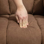 Close-up of brown lift recliner upholstery with thick cushioned armrest