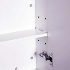 Close-up of adjustable shelf supports and mounting holes inside a white bathroom cabinet
