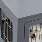 Grey dog crate corner with wire-bar side door and metal hinge latch