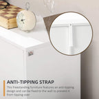 White freestanding cabinet with anti-tipping strap attachment