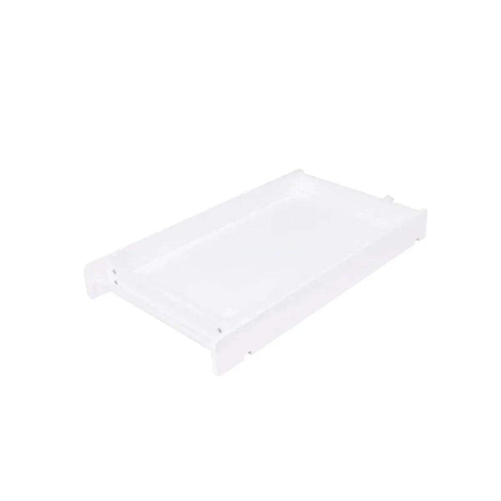 White changing table with safety rails and flat top