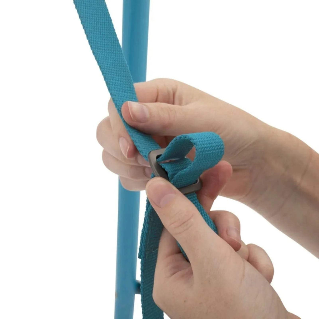 Hand pulling a blue webbing strap attached to a swing frame.