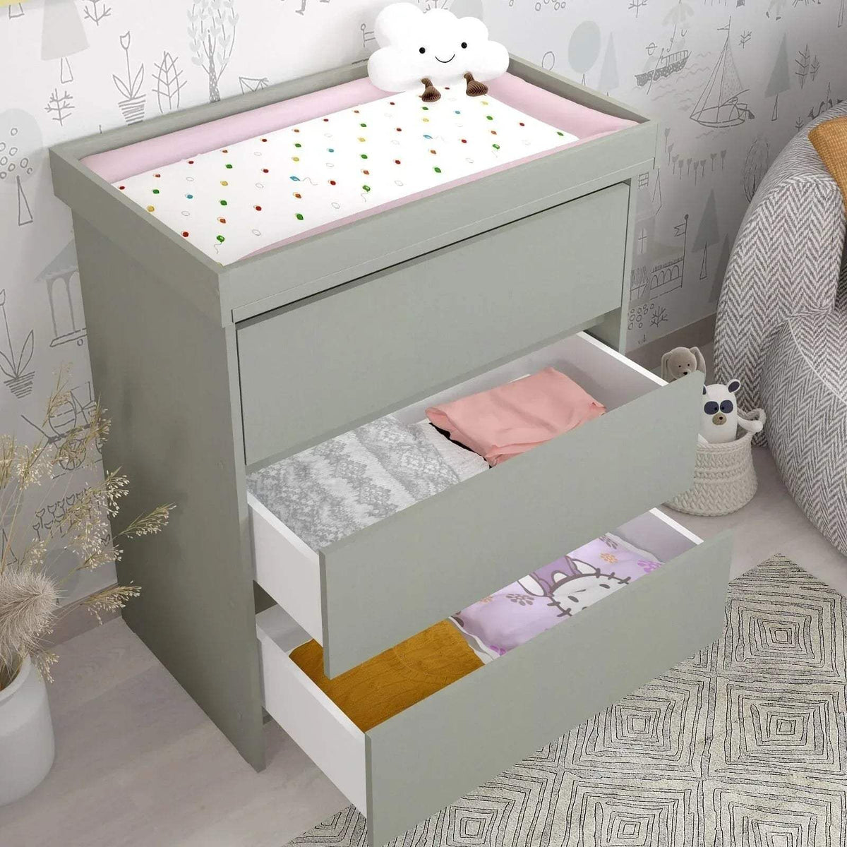 Grey changing unit with open top and two storage drawers, showing liners and pad
