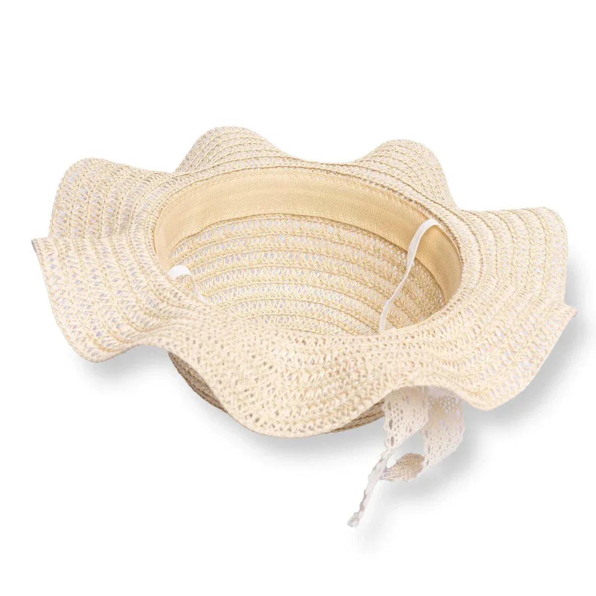 Ecru straw baby hat with ribbon trim, inside view shows soft lining