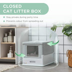 Grey closed hooded cat litter box with front opening and side ventilation panel