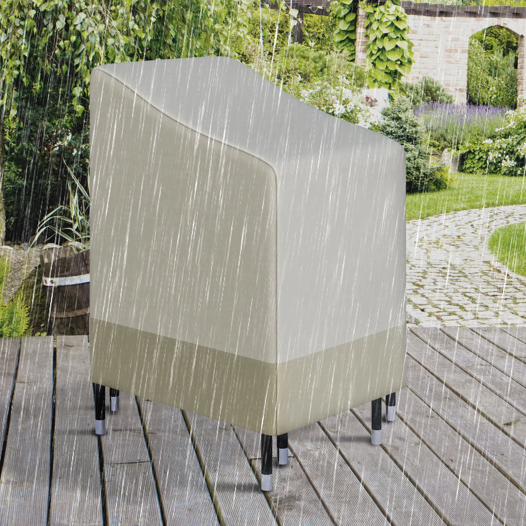 Beige and tan fitted chair cover protecting a high-back outdoor chair in heavy rain.