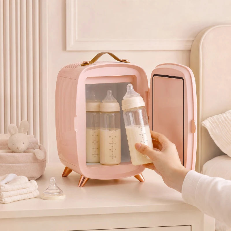 Pink mini skincare refrigerator with open door showing bottles on the interior shelf