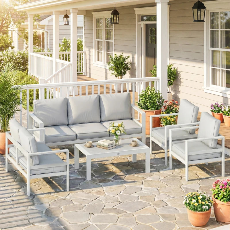 White 5-piece outdoor seating set with gray cushions, armchairs, and coffee table