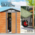 Metal garden shed with double sliding doors, open entry and interior storage view