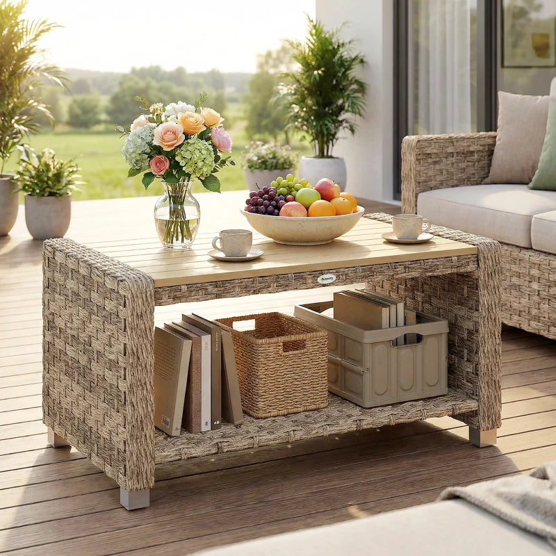 Light brown rattan outdoor coffee table with open storage shelf and slatted tabletop