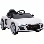 White kids electric ride-on car with black leather-style seat and open-top design