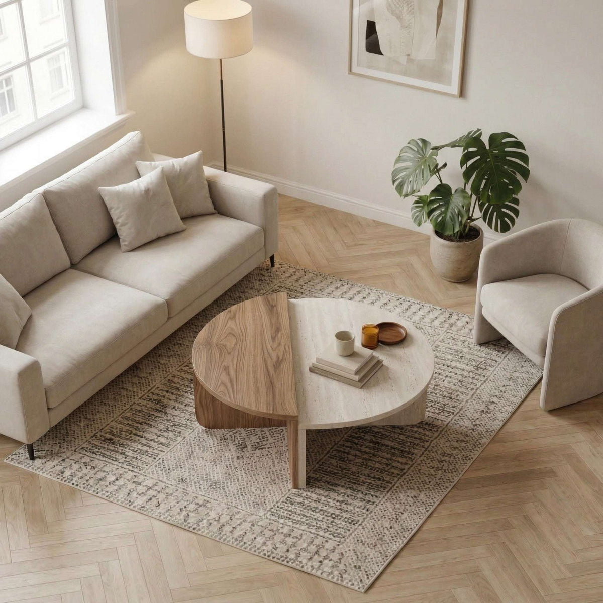 Modern round coffee table with travertine tabletop and dark wood base, curved profile
