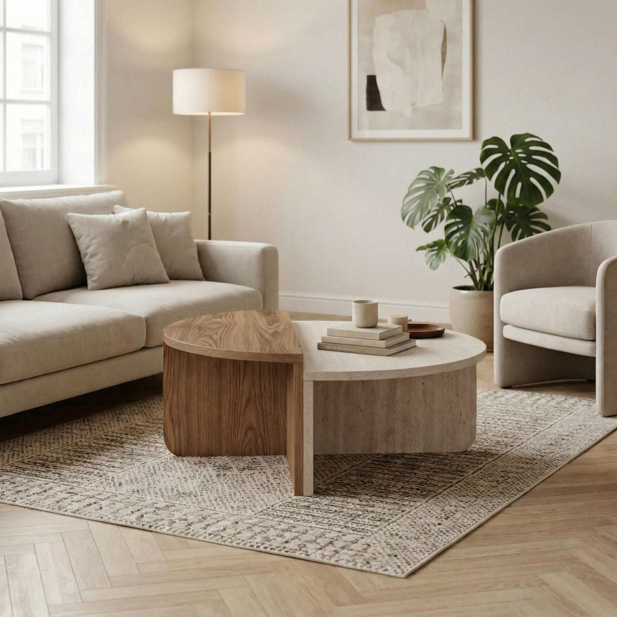Modern round coffee table with round travertine top and dark wood base, solid legs