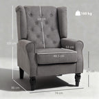 Dark grey wingback armchair with button-tufted back, padded seat, and turned legs