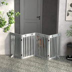 Grey foldable wooden pet gate forming a corner with paw cutout panels and slats