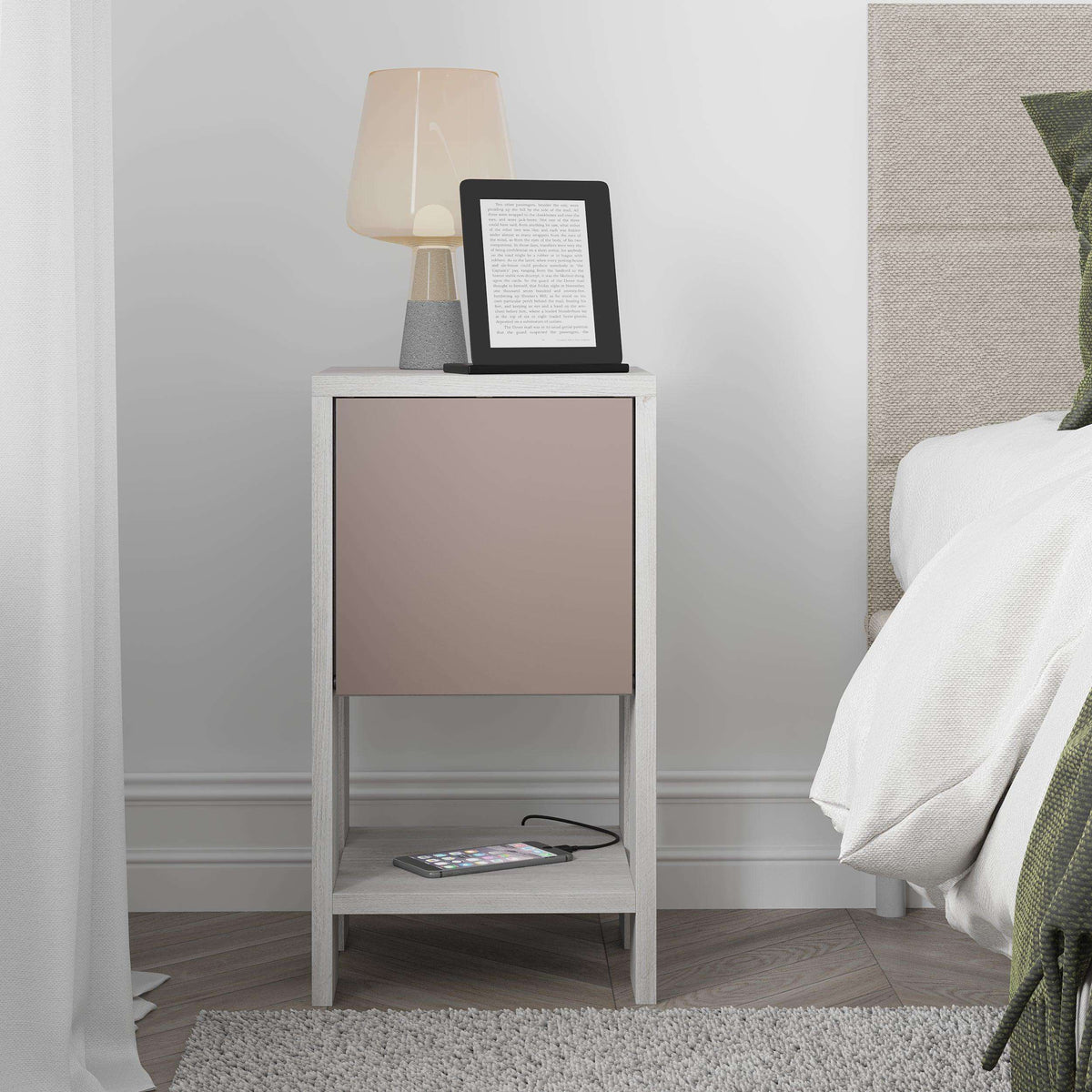 Modern bedside table with light wood legs, taupe cabinet door, and open lower shelf