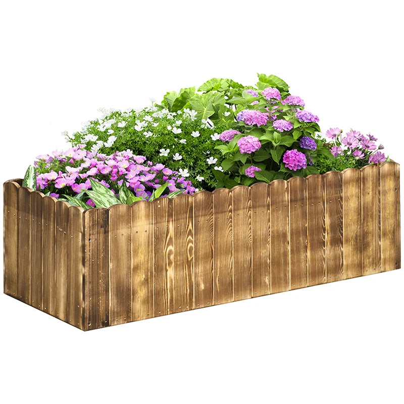 Wooden raised garden bed planter box with flowering herbs and plants