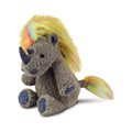 Gray plush rhino toy with rainbow mane and tail, blue horn accents, sitting pose.
