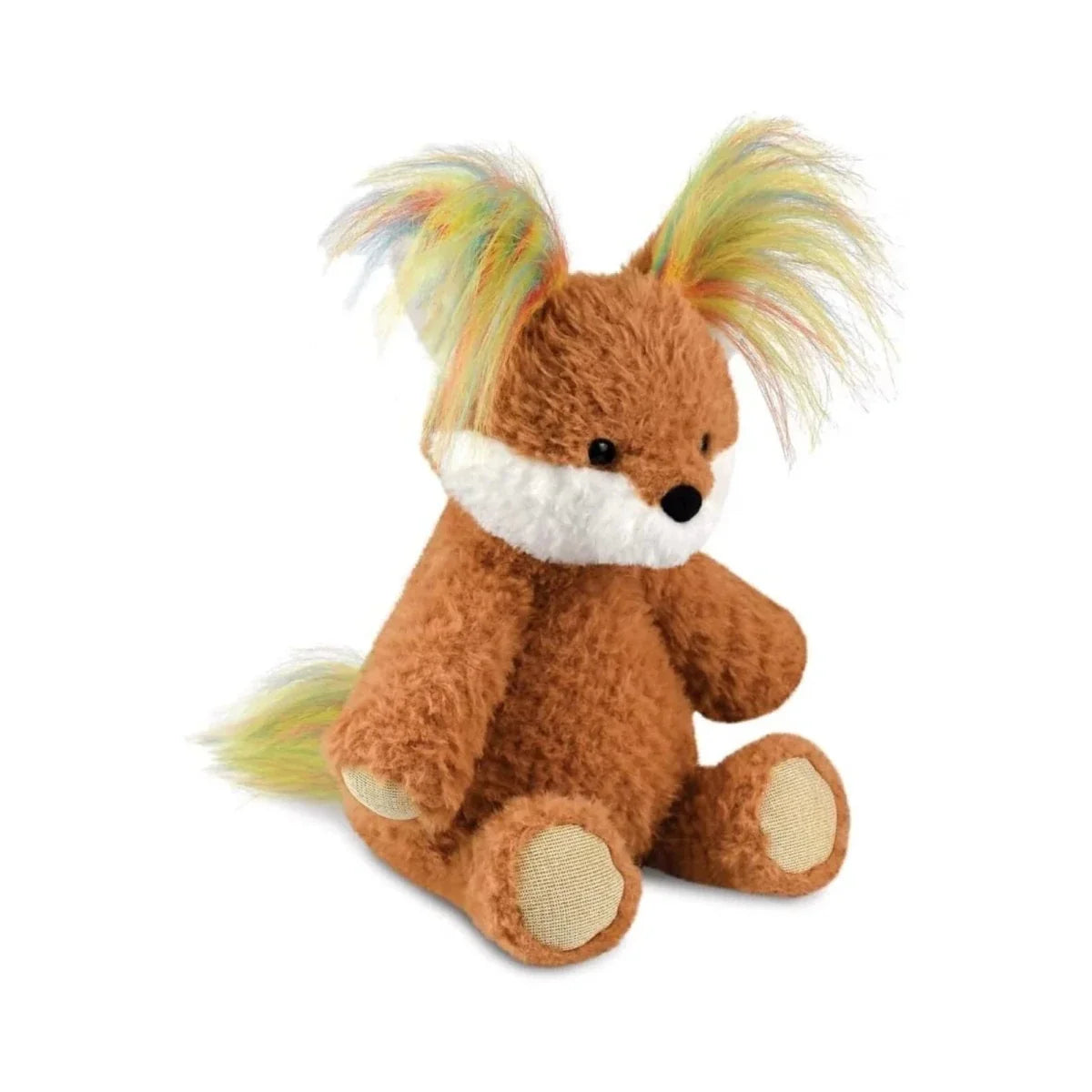 Brown fox plush toy with white muzzle, multicolor ear tufts, and seated side view