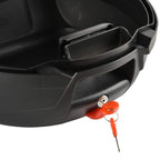 Close-up of motorcycle top case latch with orange keys and lock cylinder