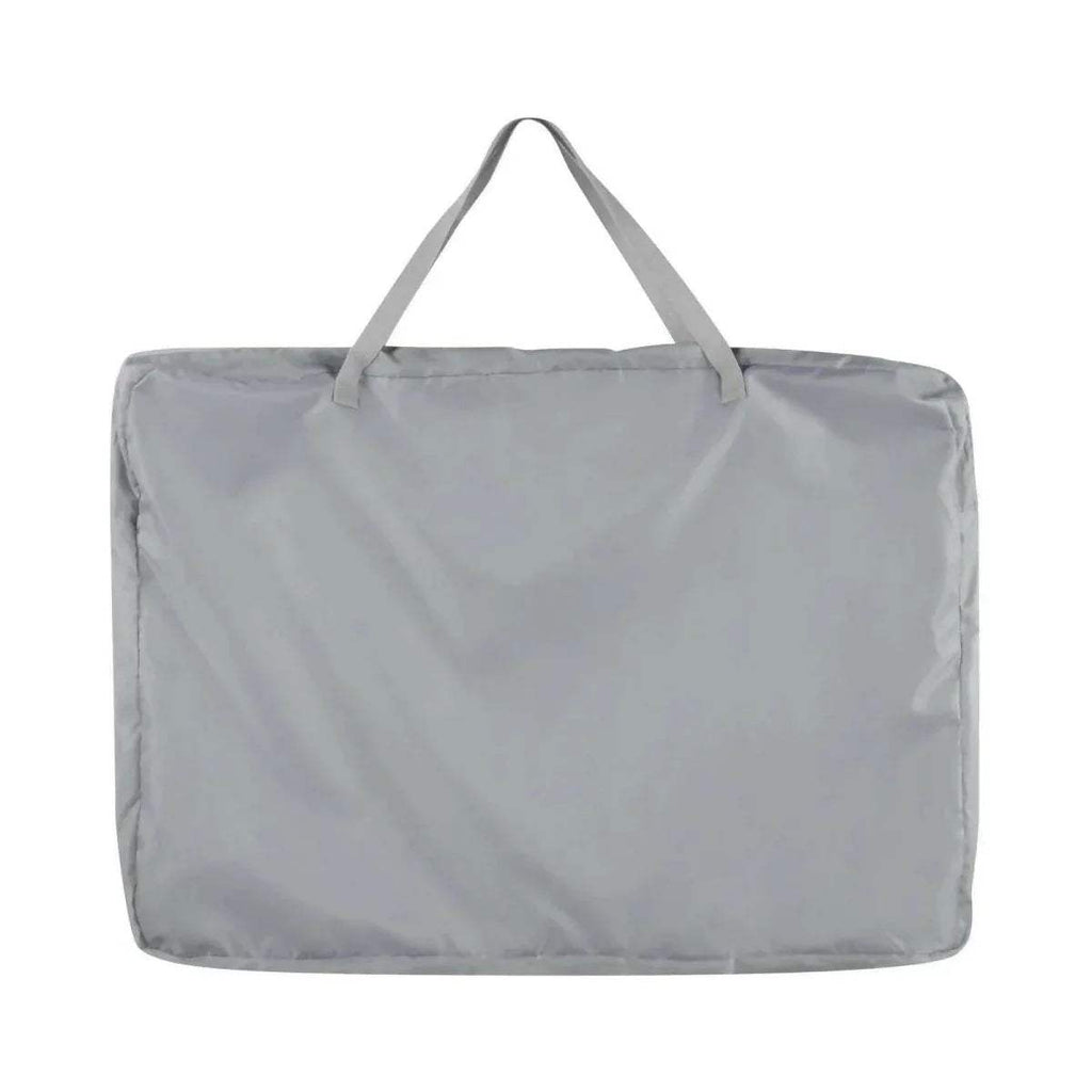 Grey carry bag with handles for bedside crib storage and transport.