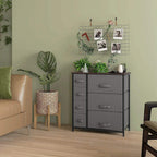 Dark grey 7-drawer fabric dresser with tabletop in a room setting.