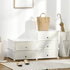 White modular storage unit with six fabric cubes, round front pull knobs, top open