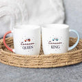 Couples mug set: white mugs with Caravan QUEEN/KING prints, coral and blue handles
