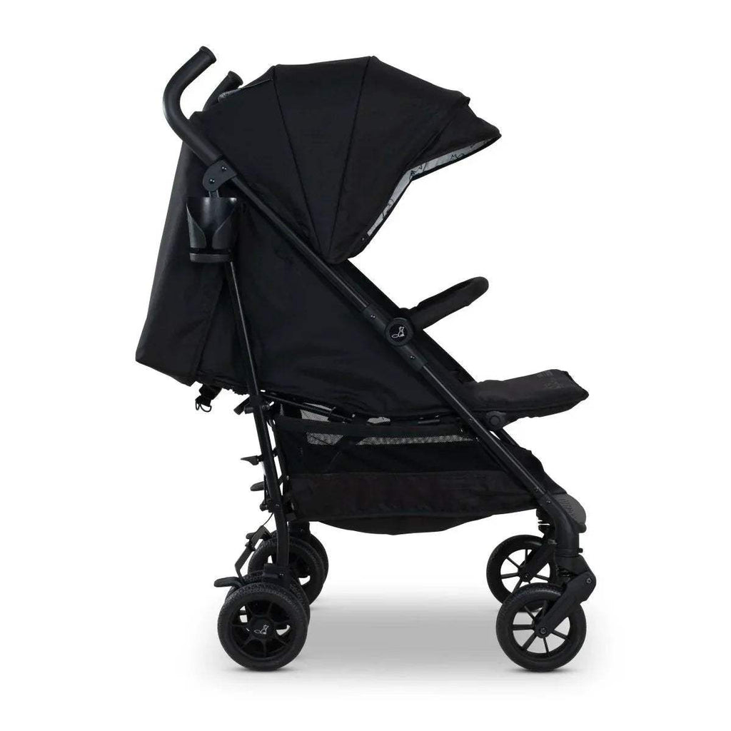 Lightweight stroller in reclined position with black canopy and five-point harness