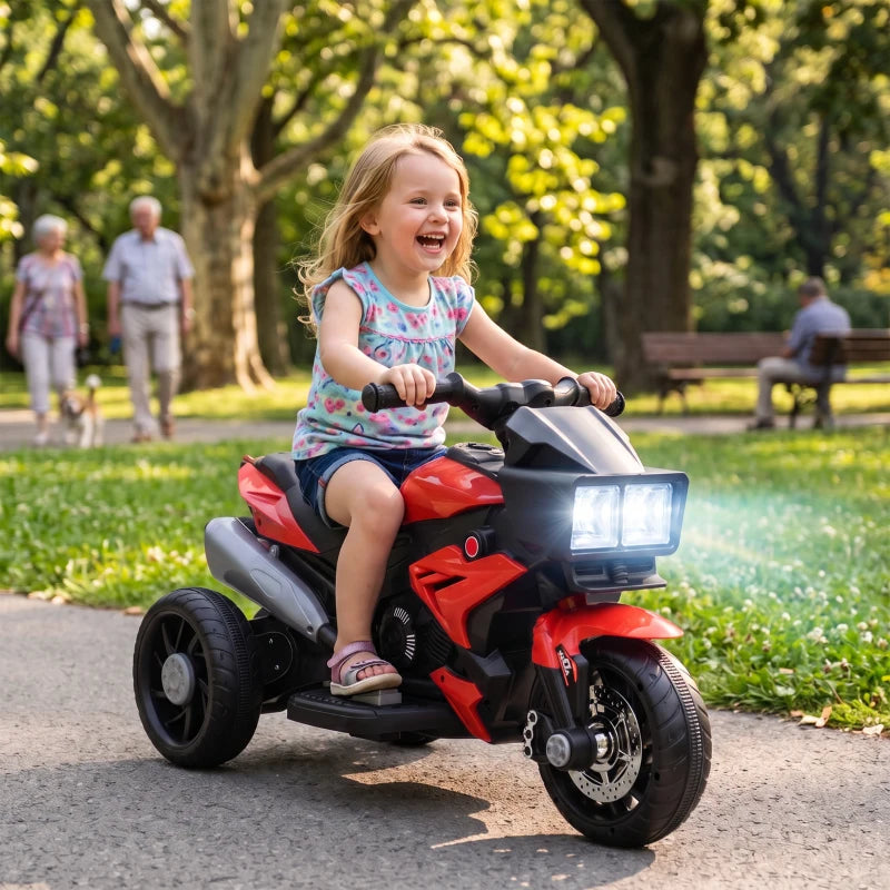 Kids red 3-wheel electric ride-on motorcycle toy with front headlight and black handlebars