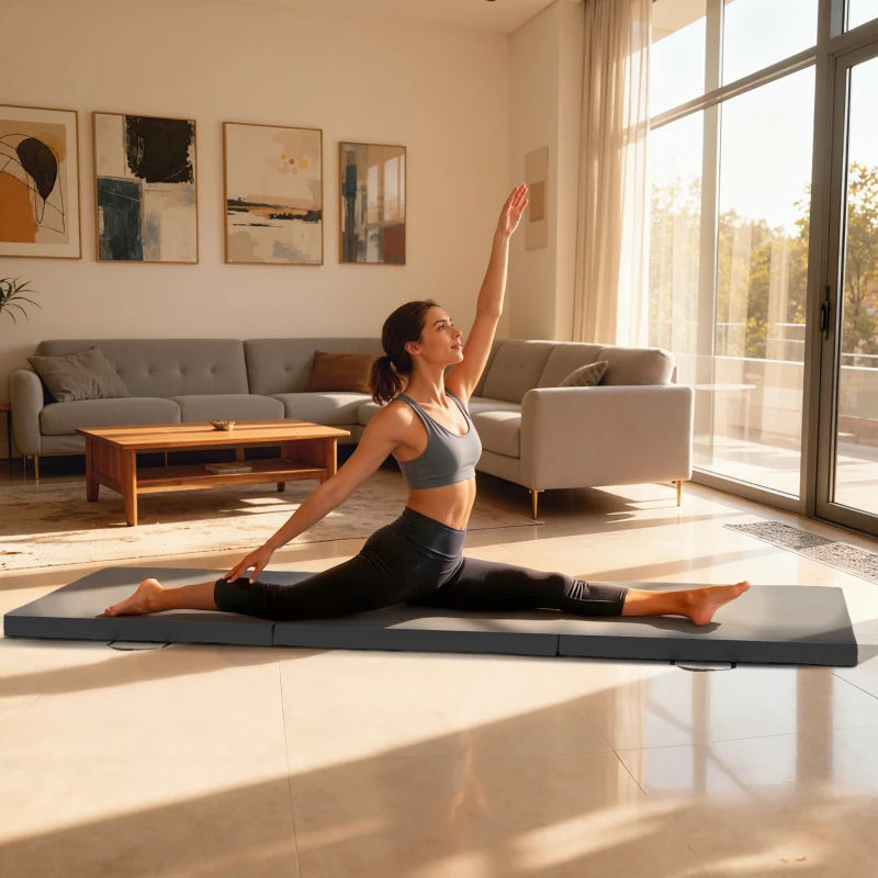 Grey foldable workout mat for floor stretching and training on hardwood flooring