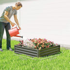 Light grey square raised garden bed with slatted walls, open top for flowers and plants