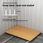 Green metal shed interior with included base frame and flat floor panel