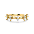 Gold ring with marquise and round crystal stones on an openwork band