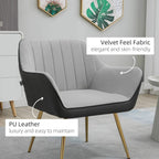 Light grey velvet accent chair with curved arms and vertical channel tufting, gold legs