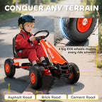 Red kids pedal go-kart with large EVA-style wheels and orange wheel hubs.
