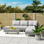 Light grey rattan corner sofa set with cushions and woven coffee table